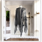 The Textured Poncho - Black Mix: Embrace Confidence, Courage, and Strength with Every Wear