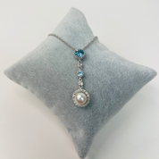 Soft Blue and Crystal Zircon Sterling Silver Pendant Necklace with Dangling Freshwater Pearl.