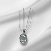 Exquisite Sterling Silver Oval Pendant Necklace with Crystal Embellishments, Featuring Three Chains for Enhanced Elegance and Versatility.