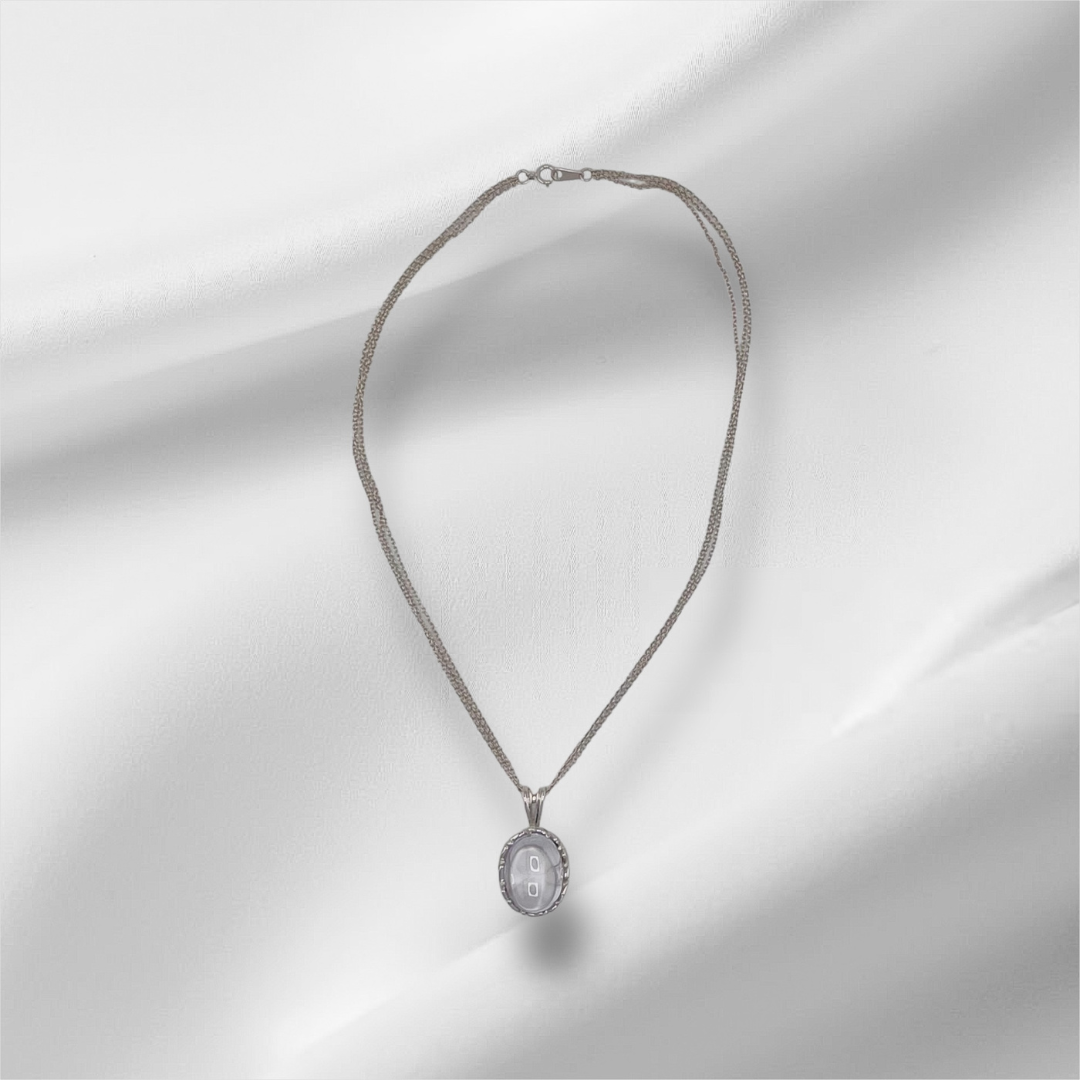 Exquisite Sterling Silver Oval Pendant Necklace with Crystal Embellishments, Featuring Three Chains for Enhanced Elegance and Versatility.