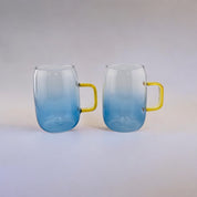 Light Sky Blue Accented Clear Glass Cold Drink Pitcher and Two Cups Set with Gold Handles