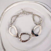 Sterling Silver Bracelet with Hammered Hoops and Smooth Loops - Toggle Clasp Design