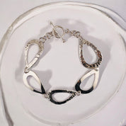 Sterling Silver Bracelet with Hammered Hoops and Smooth Loops - Toggle Clasp Design