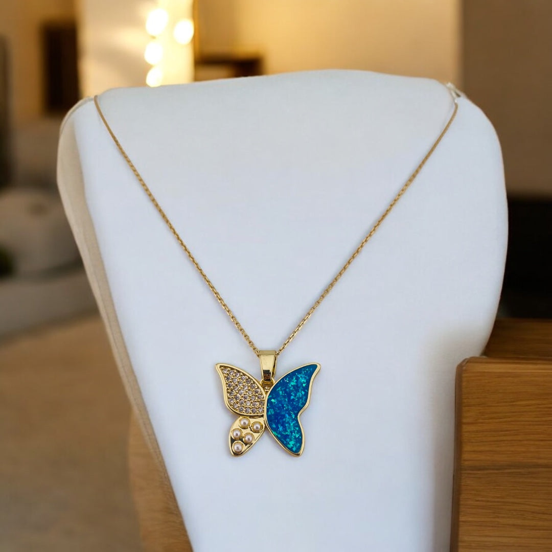 Butterfly Elegance: 18K Gold-Plated Pearl & Zircon Pendant with Blue Accents