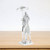 Eternal Love Under the Rain – Couple Under Umbrella Sculpture