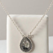 Crimson Glow – White Buffalo Turquoise Pear Shaped Necklace Sterling Silver