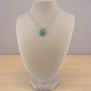 Crimson Glow – Blue Turquoise Pear Shaped Necklace Sterling Silver