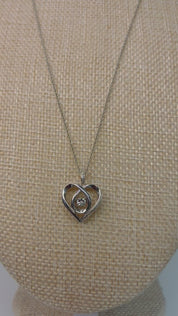 Elegant Sterling Silver Heart with Dancing Zircon Pendant Necklace